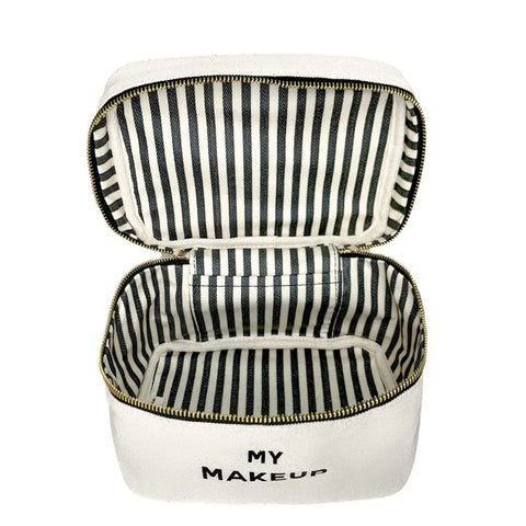 Bag-all My Makeup Cosmetic Box in cream with black and white striped interior, featuring waterproof lining and gold zipper details - perfect for organizing beauty essentials