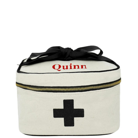 Bag-all Meds and First Aid Storage Box in cream cotton with black cross design, personalized name Quinn, black bow detail and gold zipper