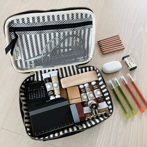 Bag-all Double Sided Multi Use Case in Black featuring striped interior, mesh compartments, organized with stationery supplies, makeup and everyday essentials