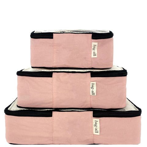 Bag-all Cotton Packing Cubes in Pink/Blush, set of 3 stackable travel organizers with mesh tops and black zippers, perfect for organized and wrinkle-free packing