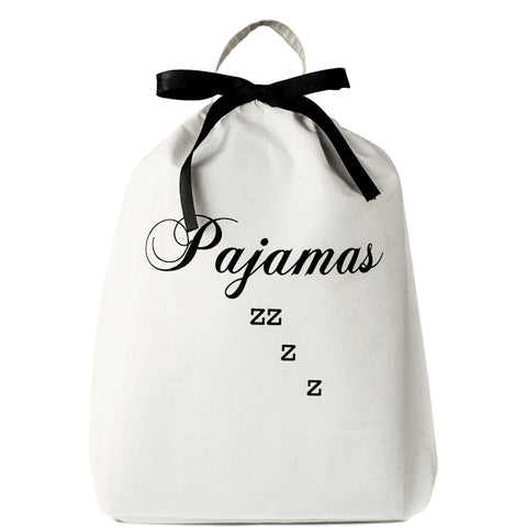 Bag-all Pajamas Zzzz Travel Bag in cream cotton with black bow, featuring elegant script lettering and cascading z's design, includes hanging handle for convenient storage