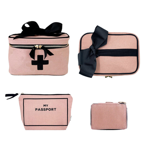 Bag-all First Aid Travel Gift Set 3-Pack in pink cotton featuring medical storage box, passport pouch and pill case with black bow accents and zipper closures