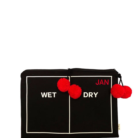 Bag-all Wet/Dry Pouch Black: Dual-compartment travel organizer with red pom-pom accent, perfect for separating wet and dry items during beach or pool trips