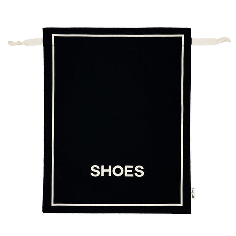 Bag-all Couture Shoe Travel Bag in black cotton with white border trim and SHOES text, featuring drawstring closure for elegant footwear storage and protection