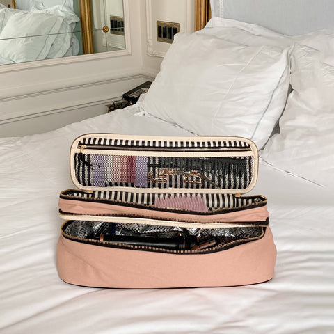 Bag-all Double Hair Tools Travel Case in Pink/Blush features dual compartments with heat-protective lining, secure bands, and storage pocket for hair styling tools and accessories