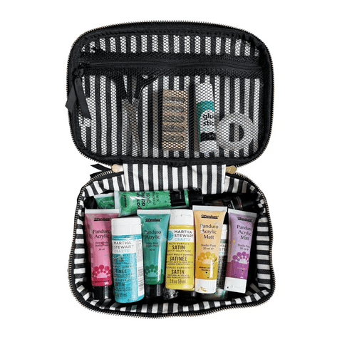Double-sided black hobby case open showing zippered mesh pocket, elastic straps, and small essentials pocket with paint tubes inside