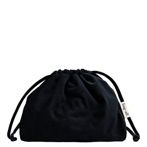 Black velvet drawstring makeup organizing bag by Bag-all, soft and spacious for easy access and travel convenience