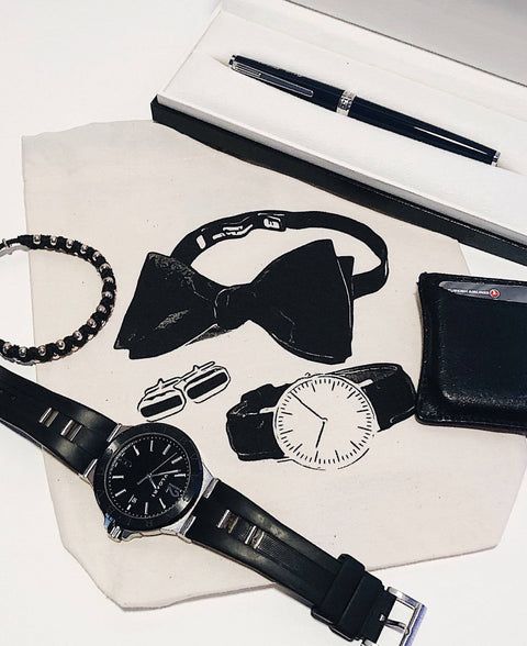Bag-all Men's Accessories Bag in Cream featuring elegant black bow tie, watches, cufflinks, and bracelet, perfect for organizing gentleman's essentials in style
