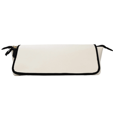 Cream-colored travel case for hair tools with black trim and double zipper closure, compact and sleek design.