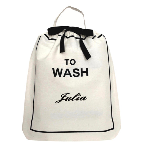 Bag-all Toiletry Travel Gift Set 4-Pack in cream featuring monogrammed To Wash cotton bag with black text and drawstring closure, perfect for organizing laundry and travel essentials