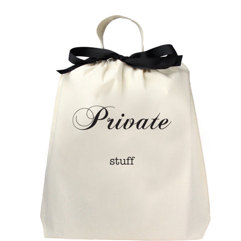 Bag-all Private Stuff Large Bag in cream cotton with black bow detail and handle, featuring elegant script text for stylish home organization and travel storage