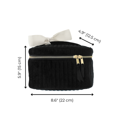 Black quilted velvet makeup cosmetic box with gold zipper and white bow handle, showing product dimensions.