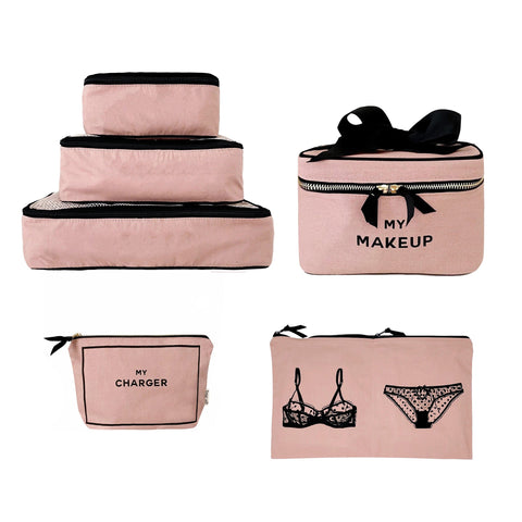 Bag-all Travel Glam 4-Pack in pink/blush featuring packing cubes, lingerie pouch with lace design, makeup case with bow, and charger organizer - cotton travel organizers for stylish packing