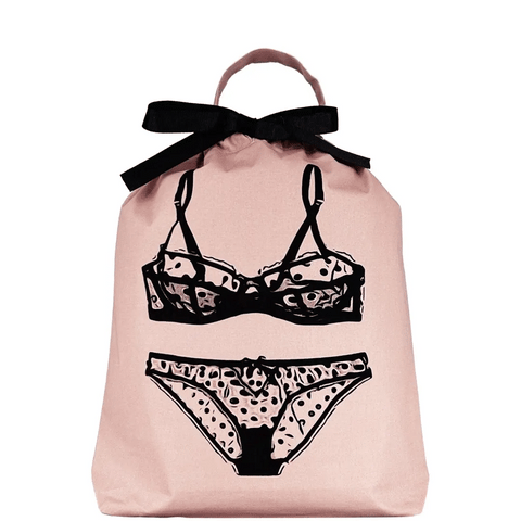 Bag-all Polkadot Lingerie Travel Bag in pink with black lingerie illustration, featuring black bow closure and handle, perfect for organizing delicates and travel