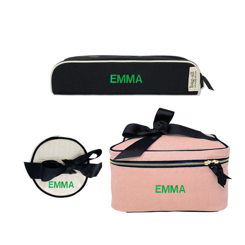 Bag-all Hair & Makeup Gift Bundle 3-set featuring black pencil case, white round case, and pink travel case with elegant black bow accents and personalized embroidery, perfect for beauty organization