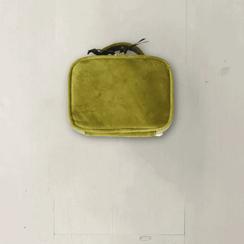Bag-all Small Beauty Box in luxurious green velvet with handle, perfect for organizing makeup and accessories, compact travel-friendly storage solution