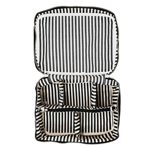 Open black and white striped large beauty box with multiple organized compartments and insert organizer inside