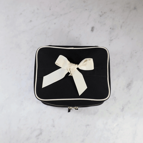 Black large vanity beauty box with white trim and bow, personalized organizer for makeup and skincare storage