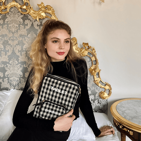 Bag-all Tablet Case 11" in black and white gingham pattern with charger pocket, showcasing stylish functionality and protective padding for modern devices
