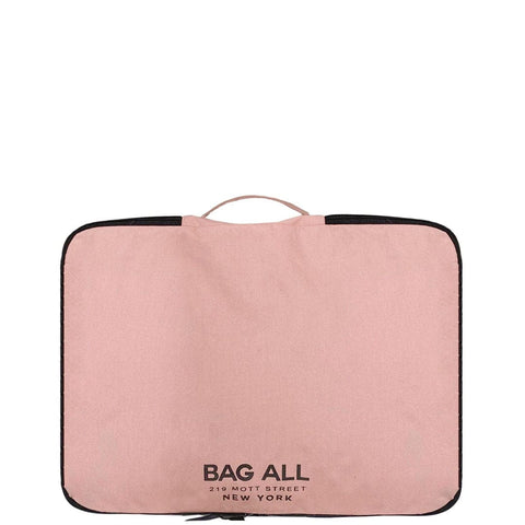 Bag-all Essentials Getaway 4-Pack in pink blush cotton featuring sleek storage solutions for travel essentials - sleep, skin, tech, and clothing organizers with black trim detail
