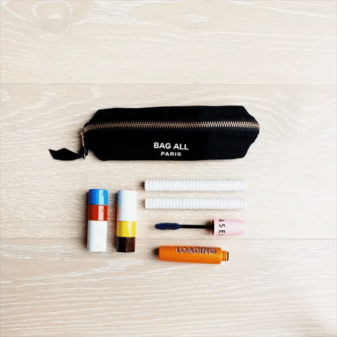 Bag-all Small Makeup Bag in Black with essential cosmetics layout - compact cotton makeup organizer with zipper closure, perfect for daily essentials and travel